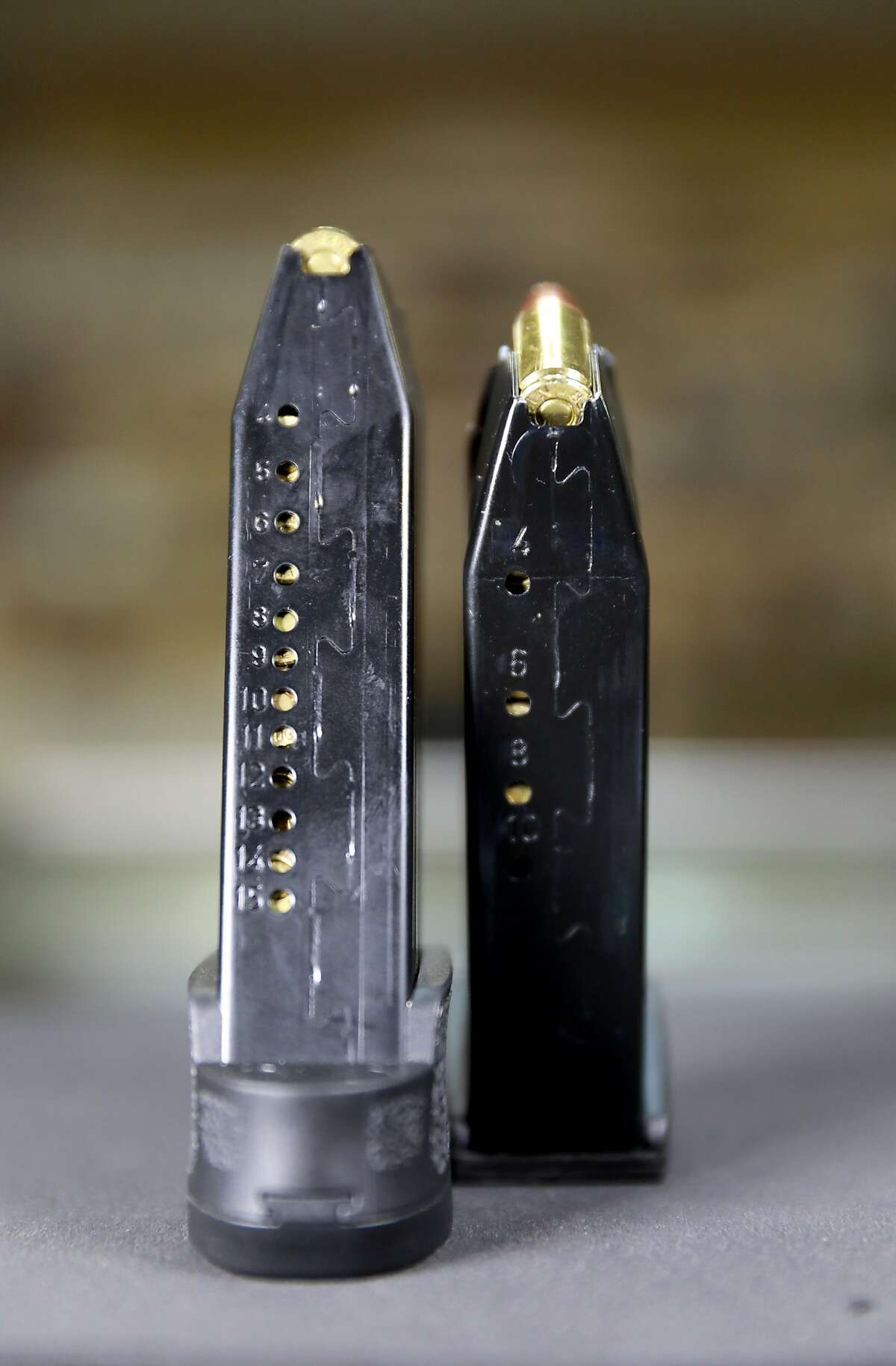 A high capacity magazine (left) has 15 rounds and the magazine to the right has 10 rounds at Coyote Point Armory, in Burlingame, Calif., on Wednesday, April 10, 2019. Last week, a federal judge ruled that California's law banning high capacity magazines (they hold more than 10 rounds) is unconstitutional. For a week, state residents could buy the ammo legally for the first time in California since 2000. But, the judge halted ruling now as it gets appealed.