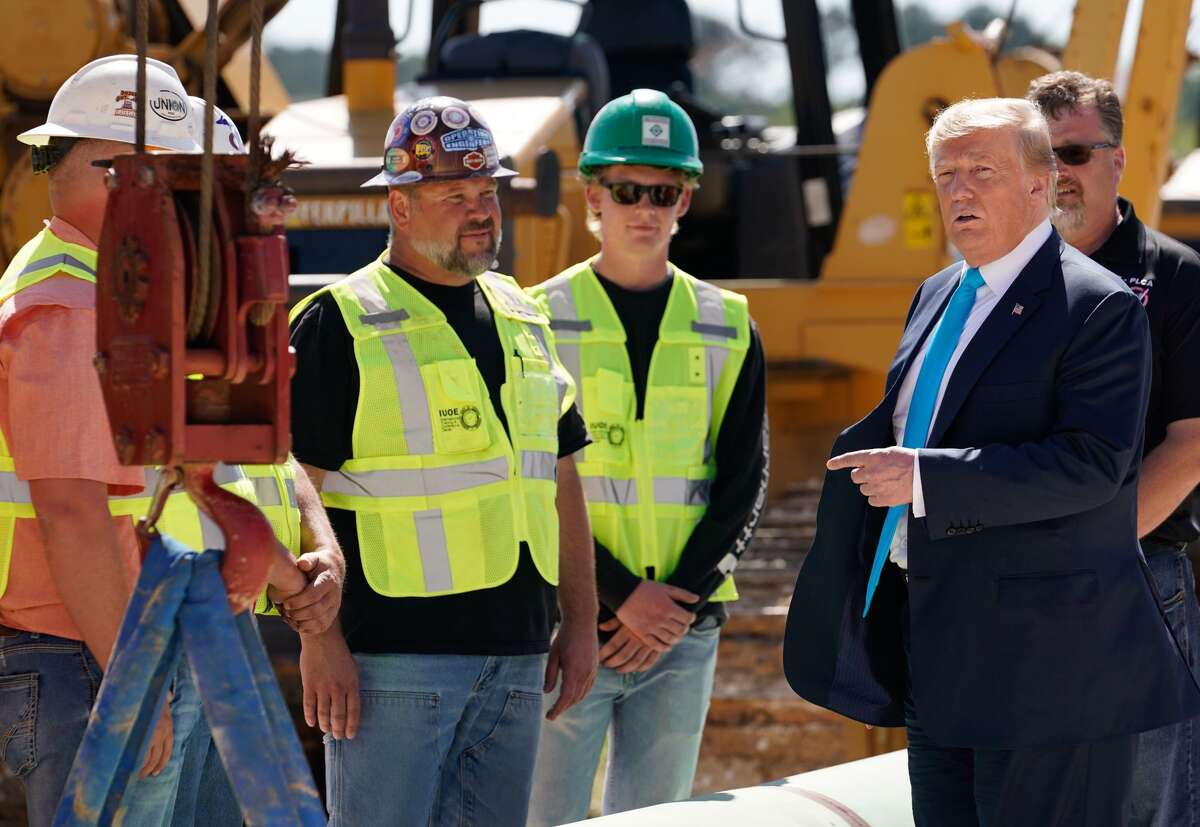 Residents line up to wait for Trump's arrival in Crosby