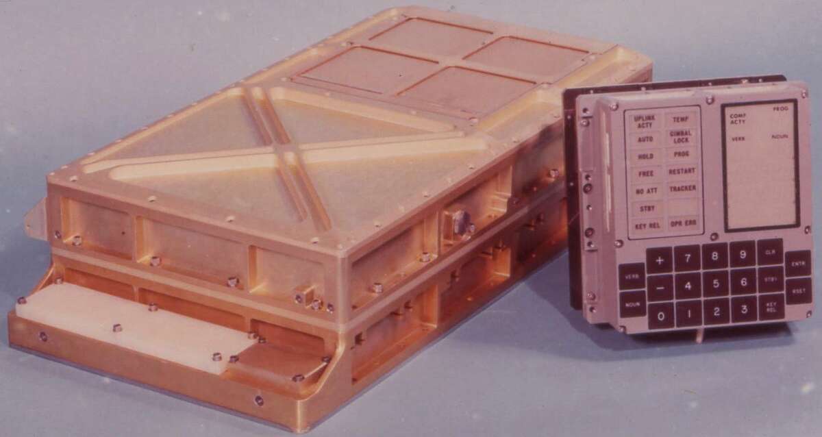 The DSKEY input module, right, shown alongside the Apollo Guidance Computer's main casing.