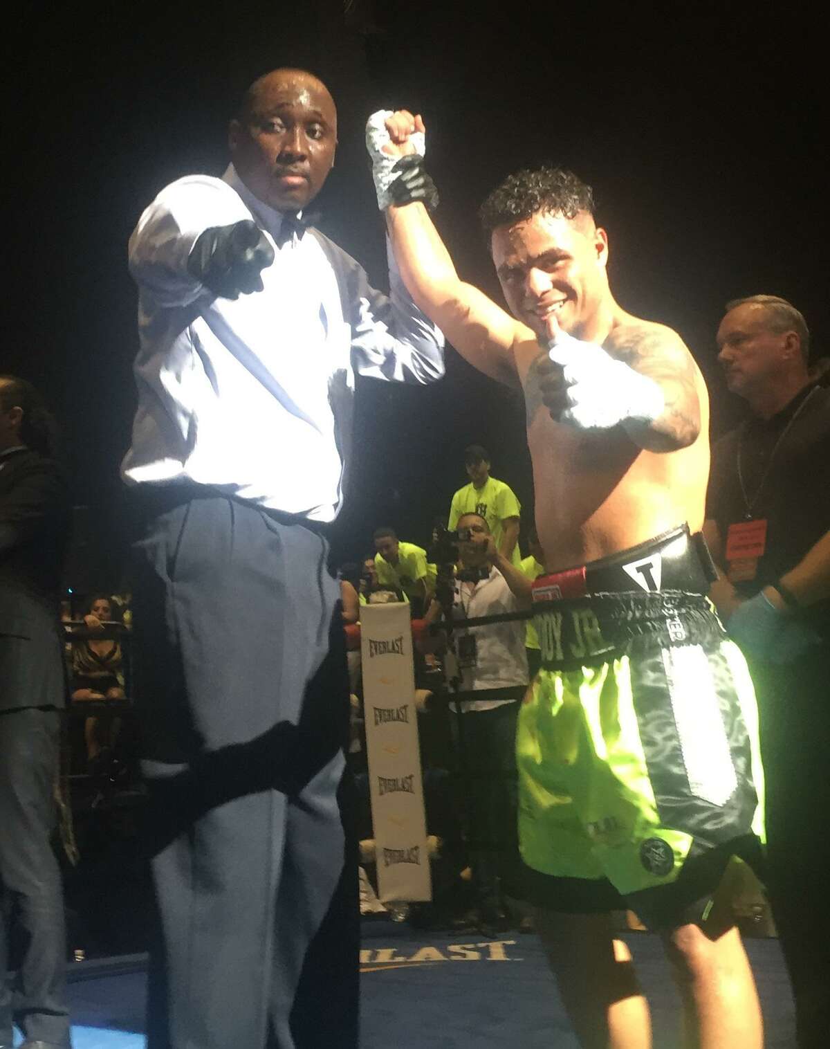 Boxer Omar Bordoy, right, is declared the winner by knockout in the sixth round of his fight against Alexander Picot at the Xfinity Theatre in Hartford on June 16, 2018.