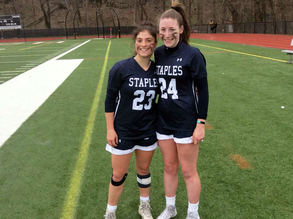 Shira Parower, left, and Kyle Kirby, powered the Staples High School girls lacrosse team to a 16-10 win over Greenwich on Tuesday, April 2, 2019 at Cardinal Stadium.