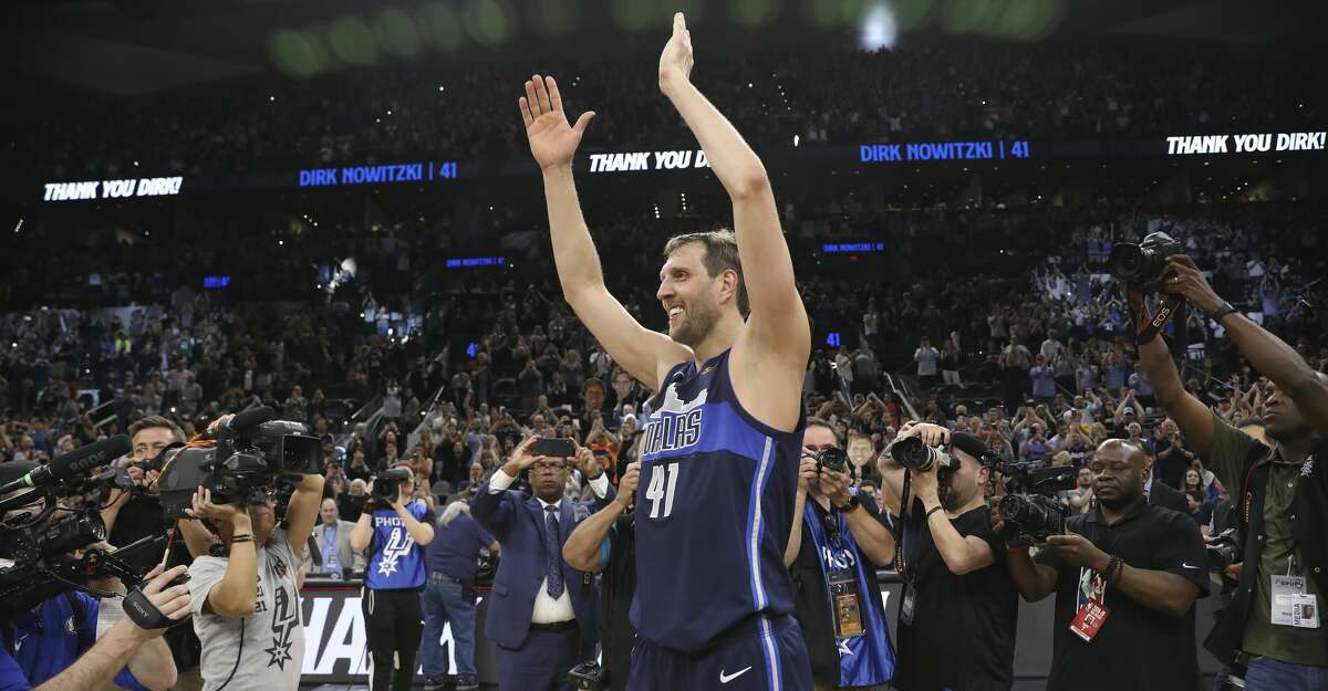 Dallas Mavericks' Dirk Nowitzki acknowledge the cheers at the end of his last career game against the San Antonio Spurs at the AT&T Center, Wednesday, April 10, 2019. The Spurs won, 105-94.
