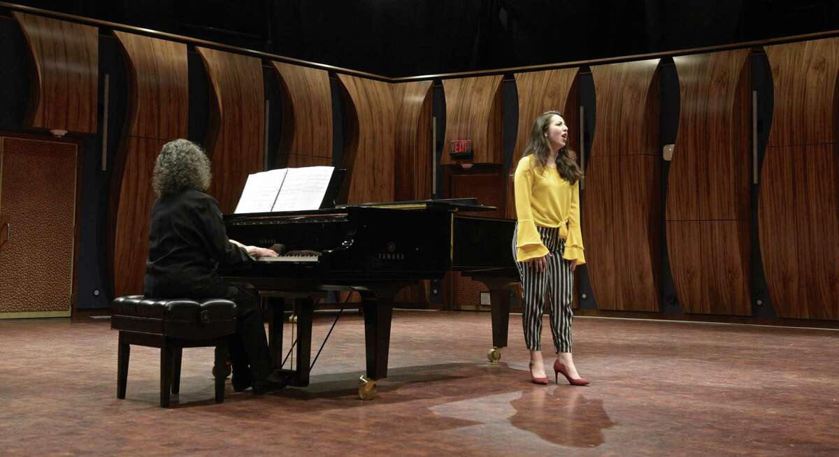 Soprano Alexandra Dima sings "Out of the South Blew a Wind" by Florence Price, accompanied by Yale University Music Lecturer Sara Kohane, during the Western Connecticut State University's School of Visual and Performing Arts Marian Anderson Tribute Concert. WCSU vocal students performed songs by four leading African American female composers to celebrate the 80th anniversary of Anderson's concert on the steps of the Lincoln Memorial in 1939. In Veronica Hagman Concert Hall. Tuesday, April 9, 2019, in Danbury, Conn.