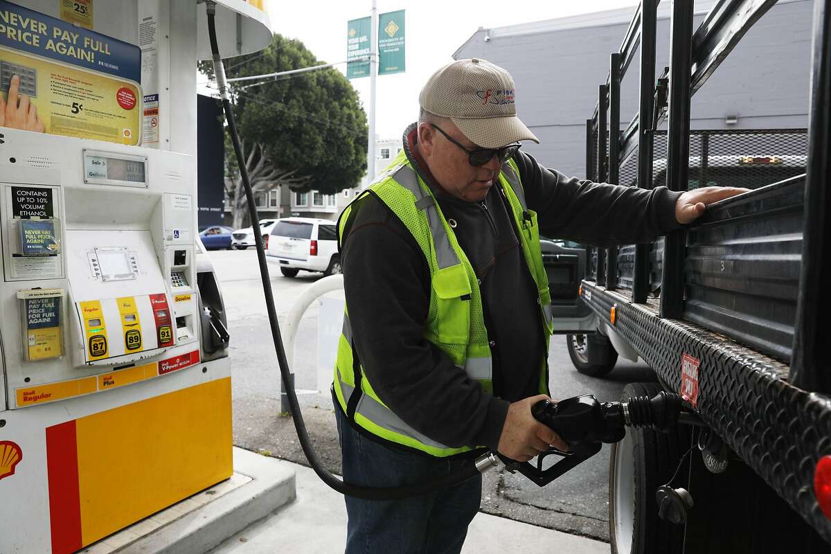 Paul Koplen of San Mateo, fills a truck with gas on Thursday, April 11, 2019 in San Francisco, Calif.