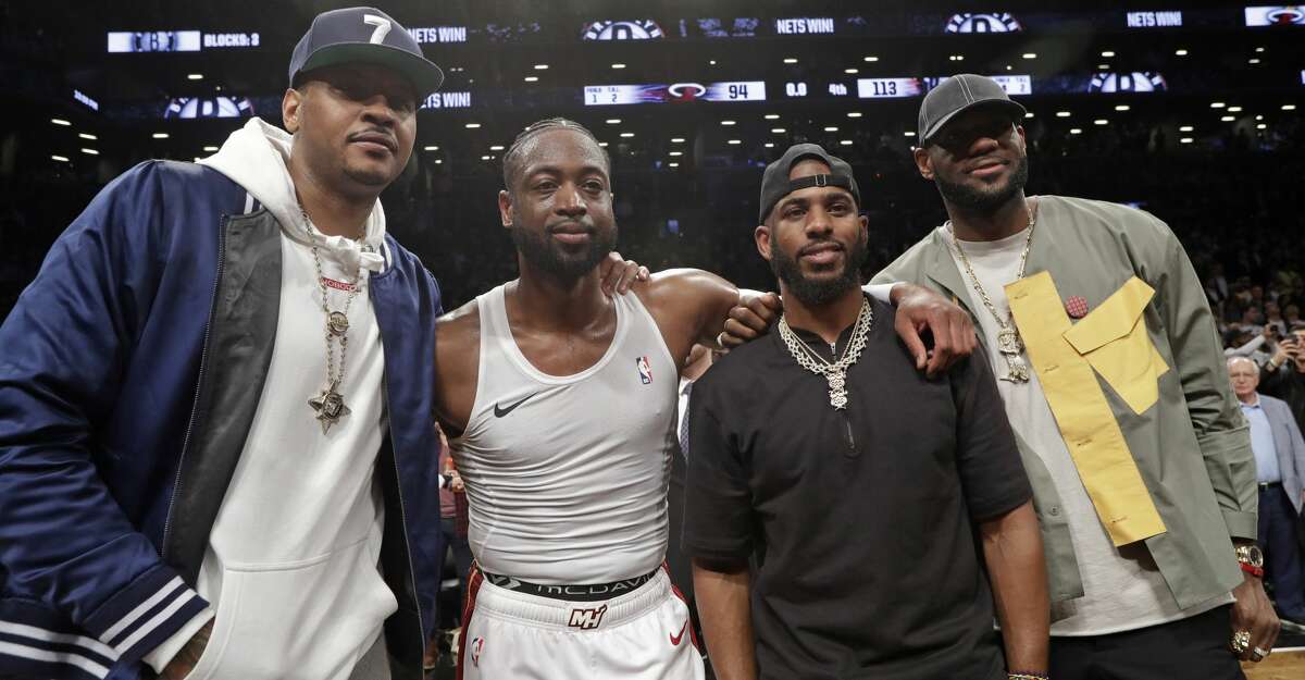 PHOTOS: Rockets game-by-game Carmelo Anthony, Miami Heat guard Dwyane Wade, Houston Rockets guard Chris Paul and Los Angeles Lakers forward LeBron James. from left, pose for a photographs on the court after Wade's final NBA basketball game, against the Brooklyn Nets on Wednesday, April 10, 2019, in New York. (AP Photo/Kathy Willens) Browse through the photos to see how the Rockets fared in each game this season.
