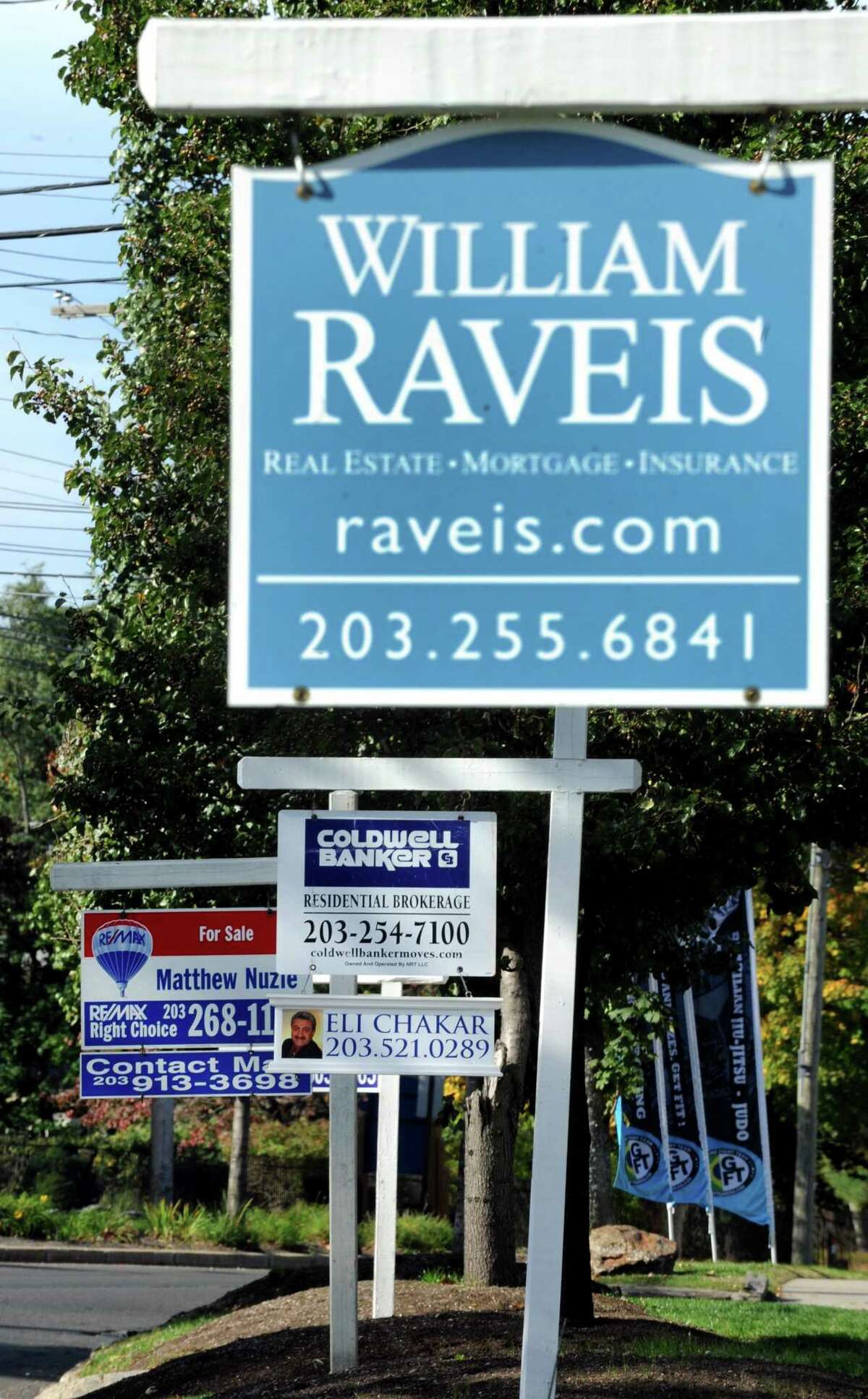 A file photo of real estate signs on North Ave. in Bridgeport, Conn., with the state’s largest city seeing a 22 percent increase in home sales in the first quarter of 2019, even as New Haven and Stamford registered big declines.