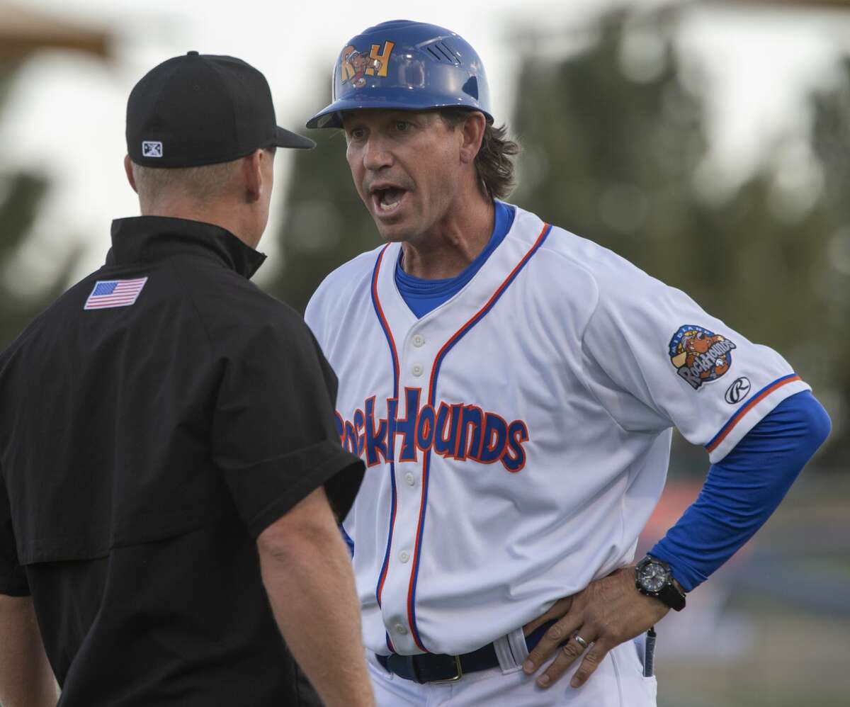 RockHounds' manager Scott Steinmann argues with third base umpire Brian Walsh 04/11/19 after a call reversal on a catch by Frisco outfielder after the initial call was the ball hit the ground during the home opener at Security Bank Ballpark. Tim Fischer/Reporter-Telegram