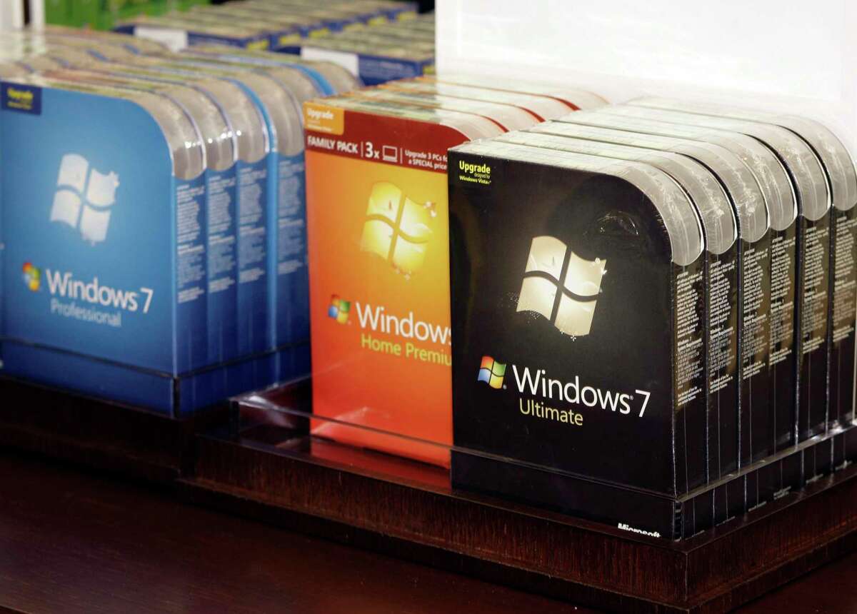 Packages of Microsoft's newly-released operating system, Windows 7, are lined up for purchase inside the company's first retail store grand opening Thursday, Oct. 22, 2009, in Scottsdale, Ariz. Support for Windows 7 ends on Jan. 14, 2020.