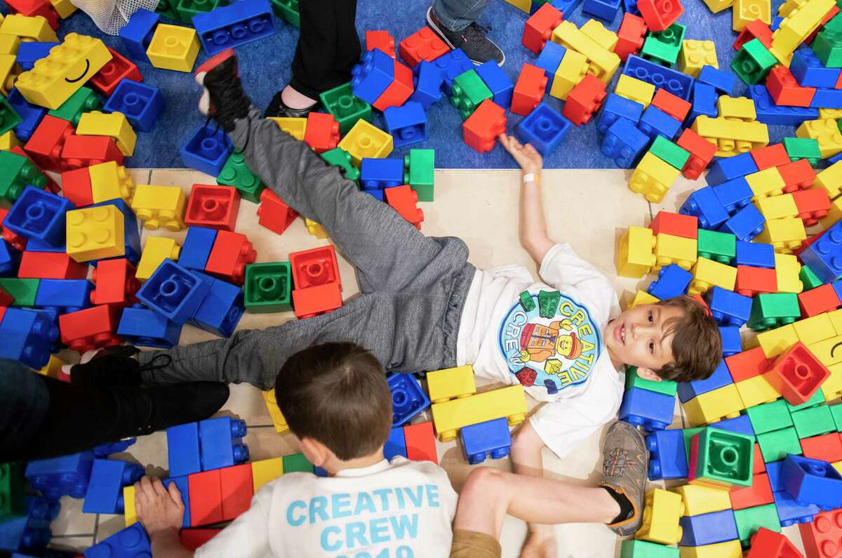 Austin Ciaravino, 8, makes a LEGO angel during the grand opening of the LEGOLAND Discovery Center in San Antonio on Friday, April 12, 2019.