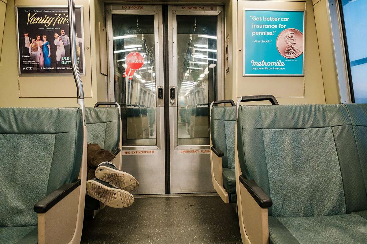 April 12, 2019 - A man sleeps on the BART to SFO. BART�s state of emergency and the exit of its general manager on Thursday come amid a new pressure: concern over homeless people evading fare on trips to SFO, where they take shelter in the terminals. (Nick Otto Special to the Chronicle)
