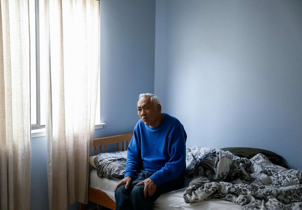Resident Jin Xue relaxes in his bedroom at Aurora Concepcion's Residential Care Home in San Francisco, Calif. Friday, April 5, 2019.
