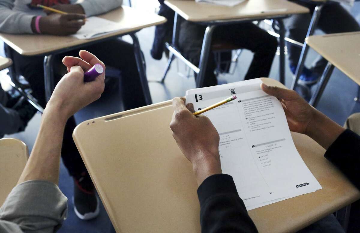 FILE -- A prep course for an SAT college entrance exam at the Business of Sports School in New York, March 1, 2016. In the wake of a federal investigation, standardized testing officials are reviewing security procedures and reconsidering special-needs arrangements that allowed cheating to occur. (Yana Paskova/The New York Times)