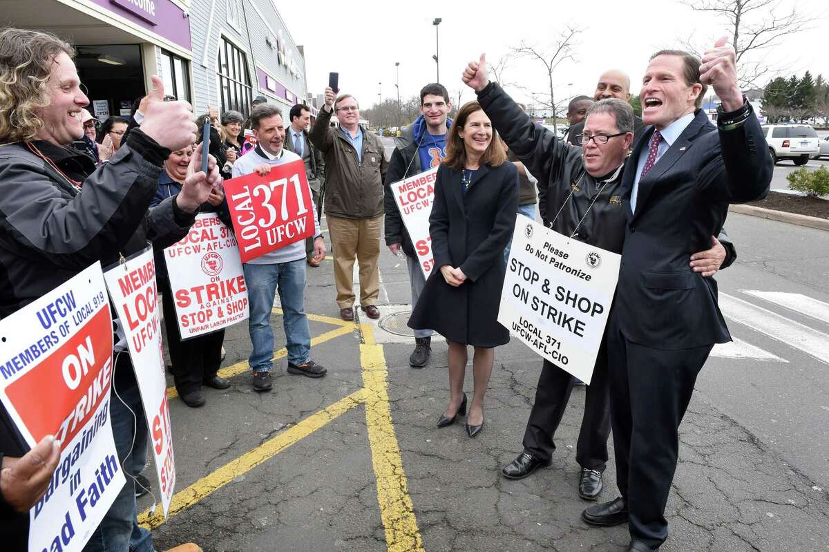 Lt. Governor Susan Bysiewicz, center, and U.S. Sen. Richard Blumenthal, right, join striking workers at the Dixwell Avenue Stop & Shop in Hamden Friday. Richie Johnson of the United Food & Commercial Workers Union Local 371 stands between Bysiewicz and Blumenthal.