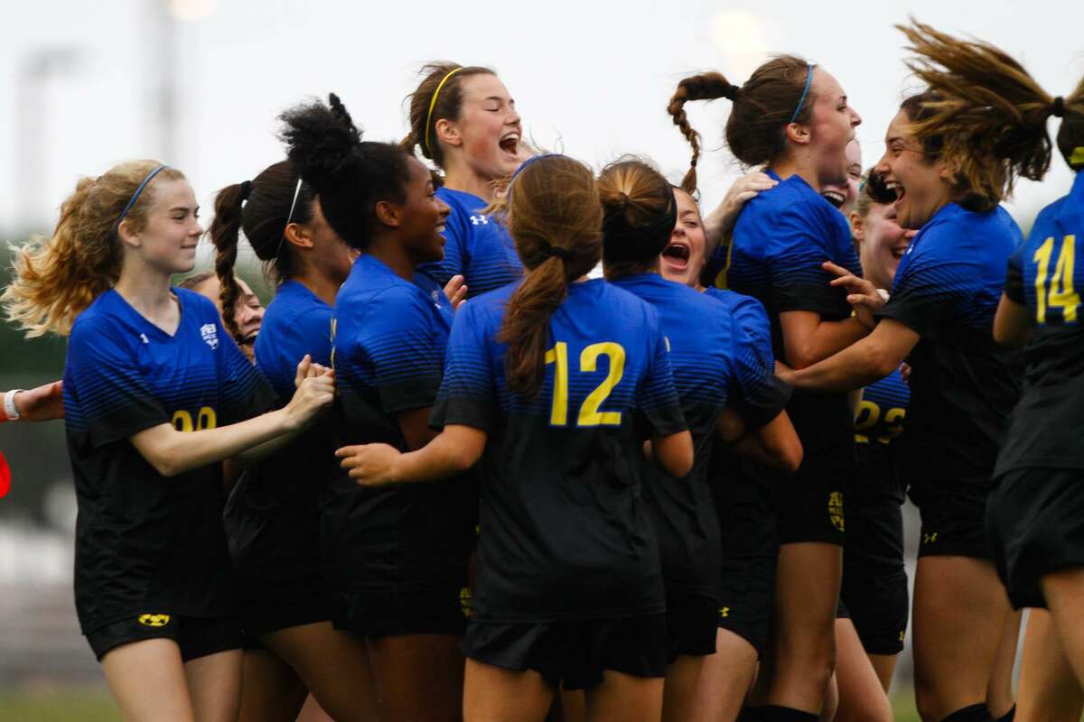 Alamo Heights celebrates after beating Victoria East in there Region IV-5A semifinal game on Friday, April 12, 2019 at Cabaniss Soccer Stadium in Corpus Christi, Texas.