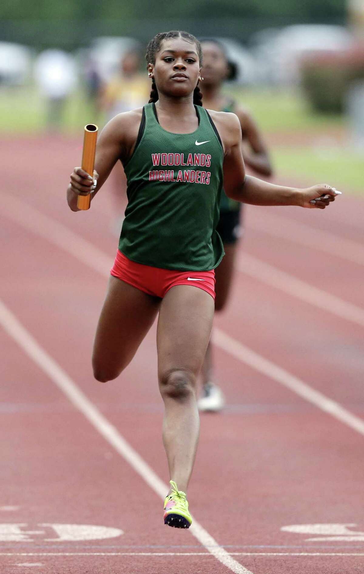 TRACK AND FIELD The Woodlands takes both District 156A titles