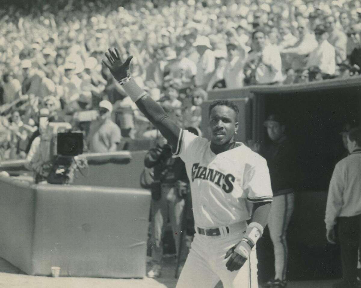 April 12, 1993 - San Francisco Giants Barry Bonds waves to the crowd after hitting a home run off Florida Marlins pitcher Chris Hammond during the second inning of their game in Candlestick Park. The game was the Giants 1993 home opener and the newly-acquired Bonds' first regular season game at Candlestick Park.