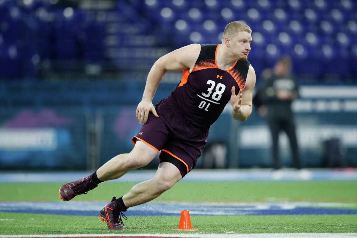 PHOTOS: New Era's official 2019 NFL Draft caps  INDIANAPOLIS, IN - MARCH 01: Offensive lineman Kaleb McGary of Washington in action during day two of the NFL Combine at Lucas Oil Stadium on March 1, 2019 in Indianapolis, Indiana. (Photo by Joe Robbins/Getty Images) >>>See the caps that will be worn by players at the 2019 NFL Draft ... 