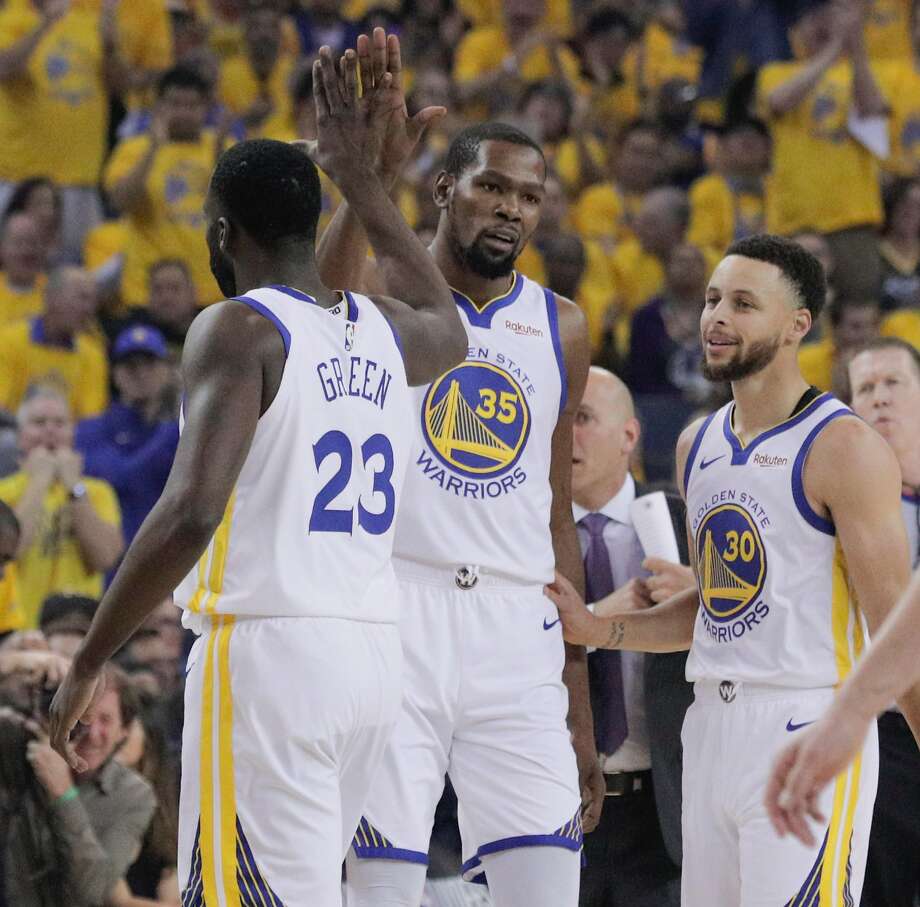 Golden State Warriors Kevin Durant Gives A High Five To Draymond Green In The First Quarter Golden State Warriors Kevin Durant Gives A High Five To Draymond Green In The First Quarter