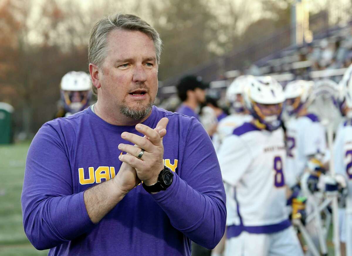 University at Albany head coach Scott Marr encourages his players before playing University of Maryland, Baltimore County's during a NCAA lacrosse game Saturday, April 13, 2019, in Albany, N.Y.