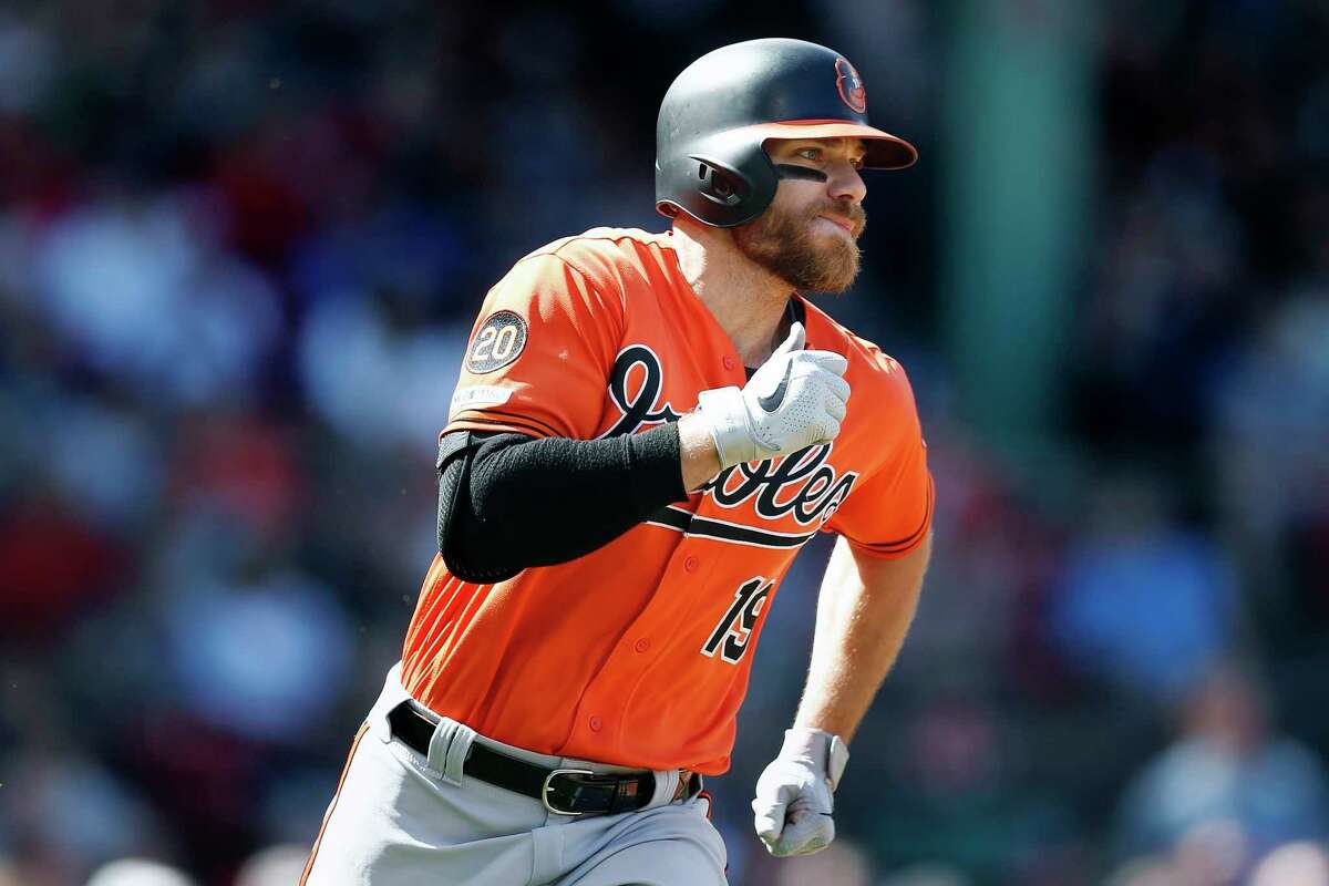 Baltimore Orioles' Chris Davis (19) runs on his RBI double during the fifth inning of a baseball game against the Boston Red Sox in Boston, Saturday, April 13, 2019. (AP Photo/Michael Dwyer)