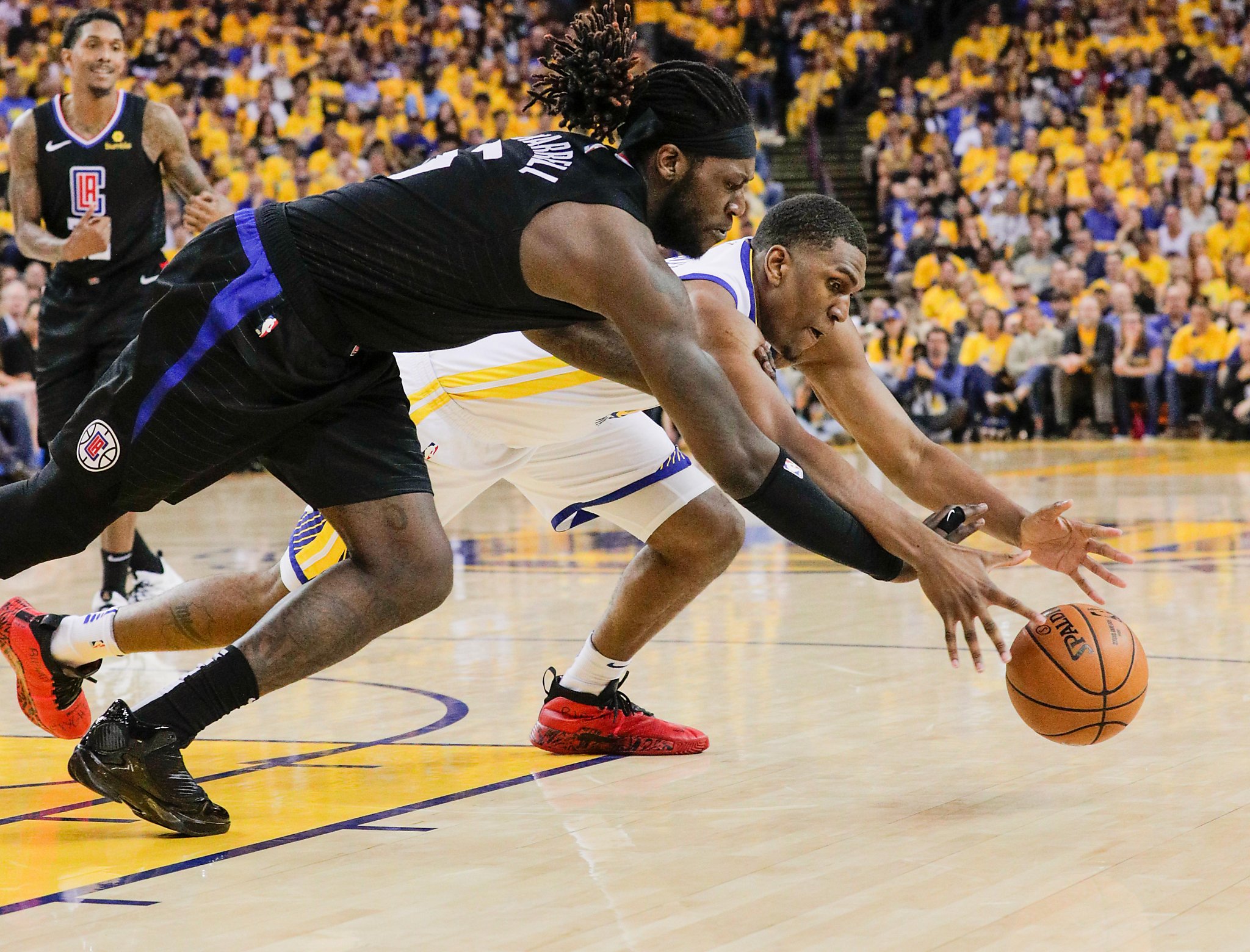 Warriors’ Kevon Looney emerges from shadows, shows off expanded game
