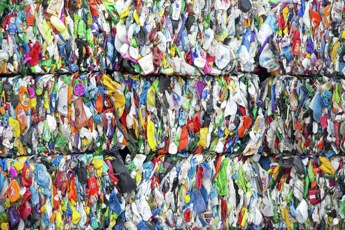 Bales of plastic that has been sorted and compressed at the Waste Management Recycling Facility Thursday November 20, 2014 in Southwest Houston, TX. (Billy Smith II / Houston Chronicle)