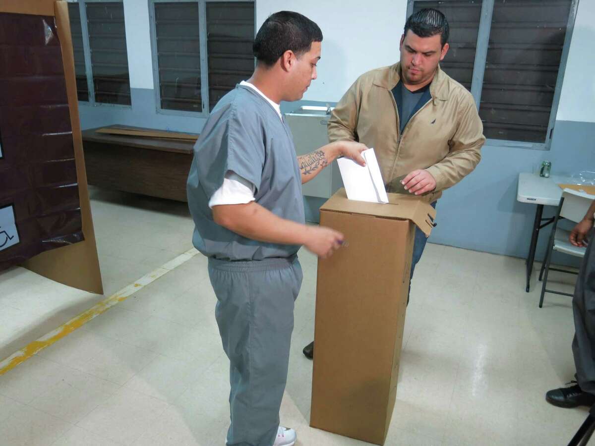An inmate votes in Bayamon, Puerto Rico. The U.S. territory has allowed inmates to vote since the 1980s.
