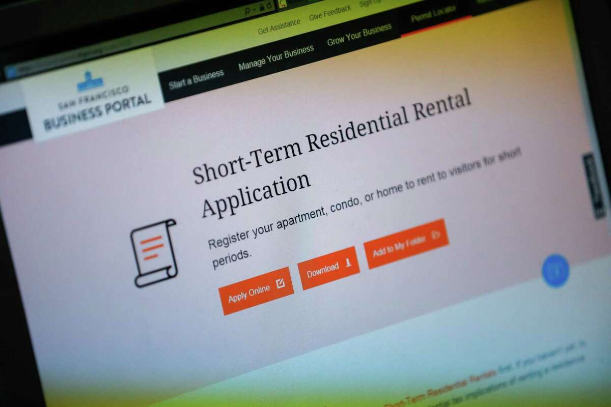 The short term residential rental application is seen on the computer Milton Martin at the office of short-term rentals in San Francisco, California, on Wednesday, Jan. 9, 2019.