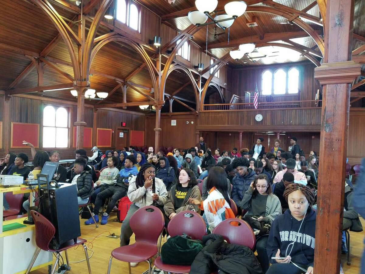 New Haven and Yale police officers, New Haven school administrators, and over 80 high school students from Career, Cooperative Arts, Hillhouse and Wilbur Cross recently assembled at the Betsy Ross Arts and Magnet Parish Hall to view the documentary video “Walking While Black.”