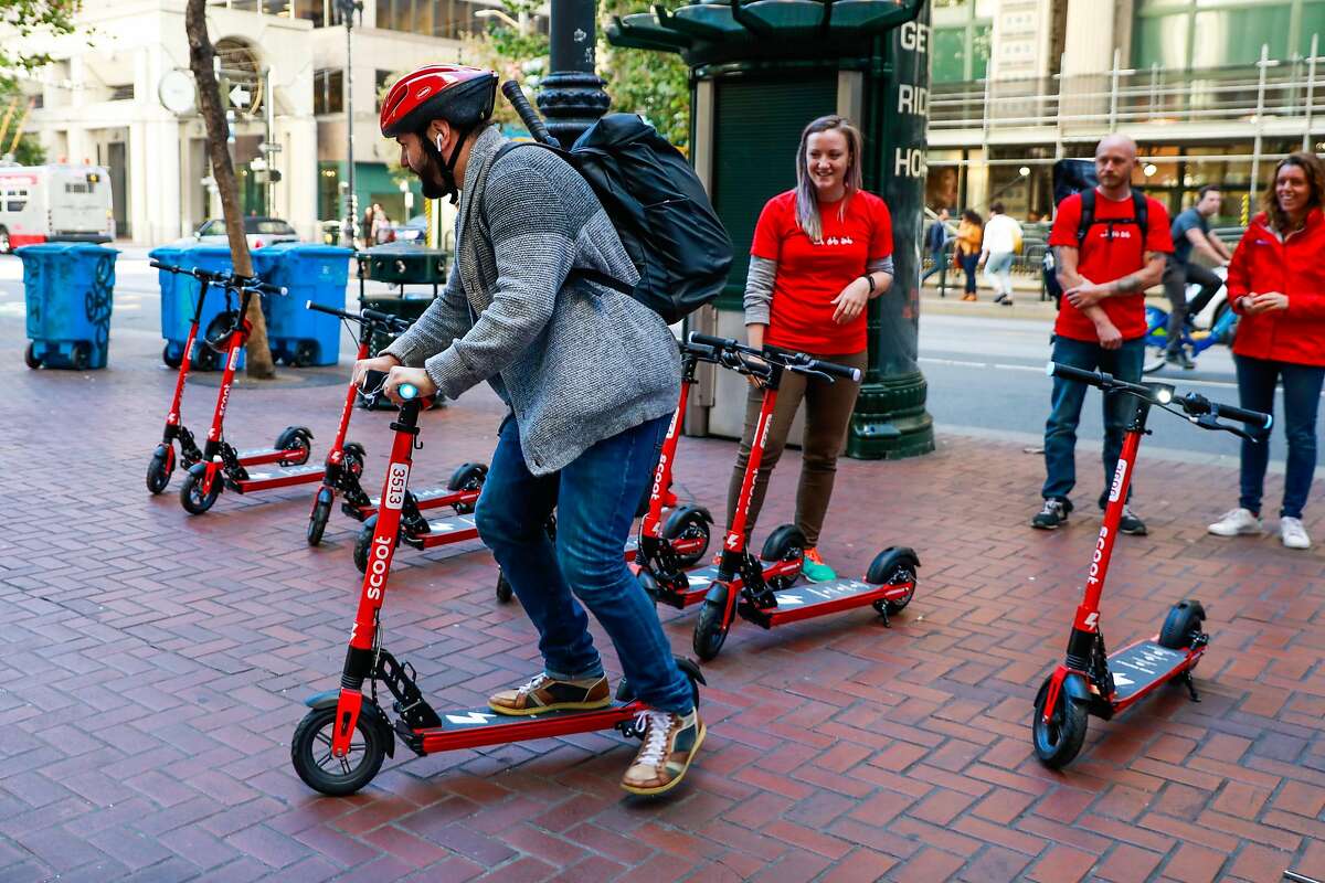 Andriy Fedorchuk takes a spin on a Scoot scooter in San Francisco, California, on Monday, Oct. 15, 2018.
