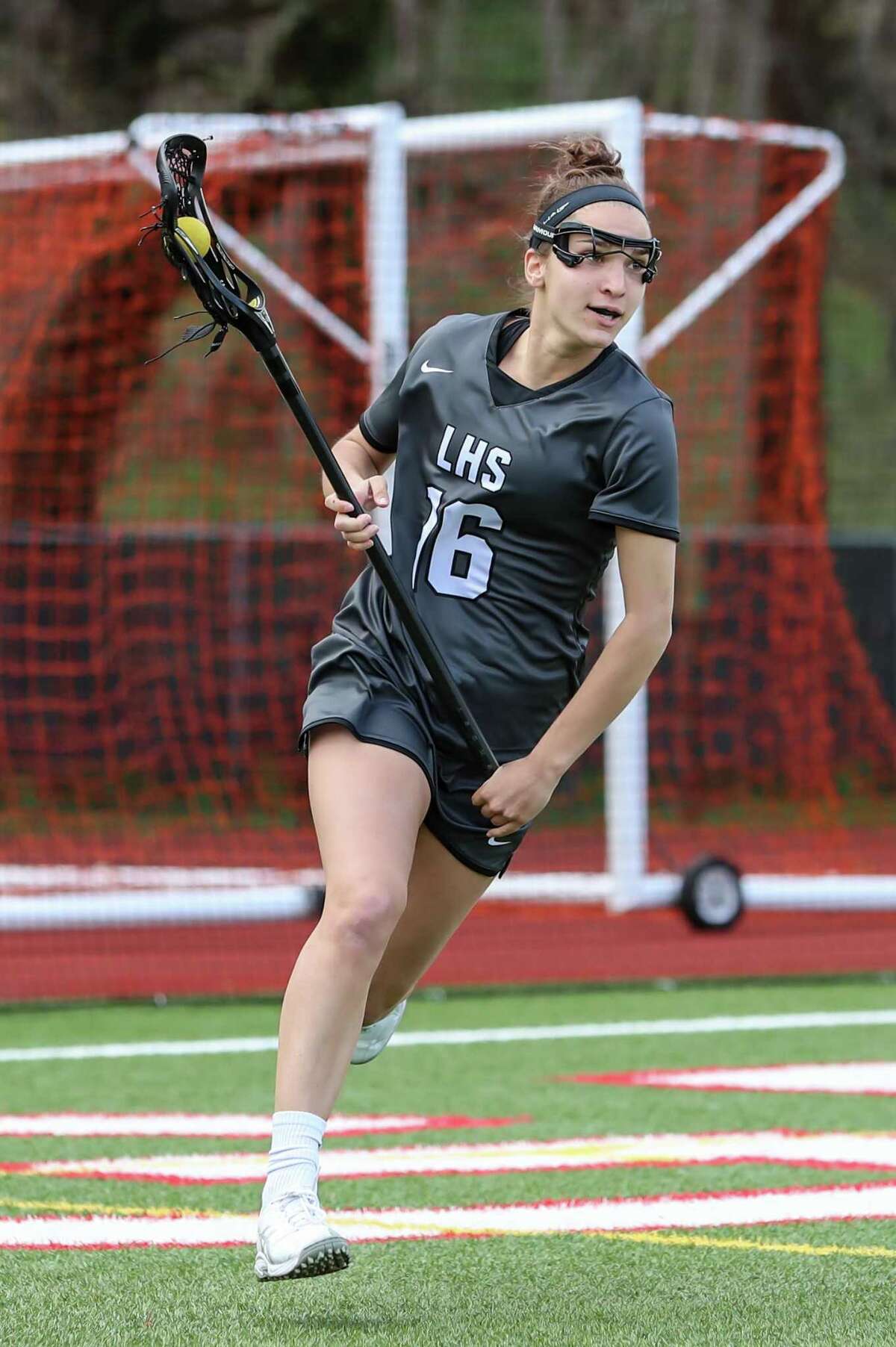 Shannon Kingston (16) of Longmeadow carries the ball during a game between Greenwich Girls Varsity Lacrosse and Longmeadow Girls Varsity Lacrosse on April 15, 2019 at Greenwich High School in Greenwich, CT.