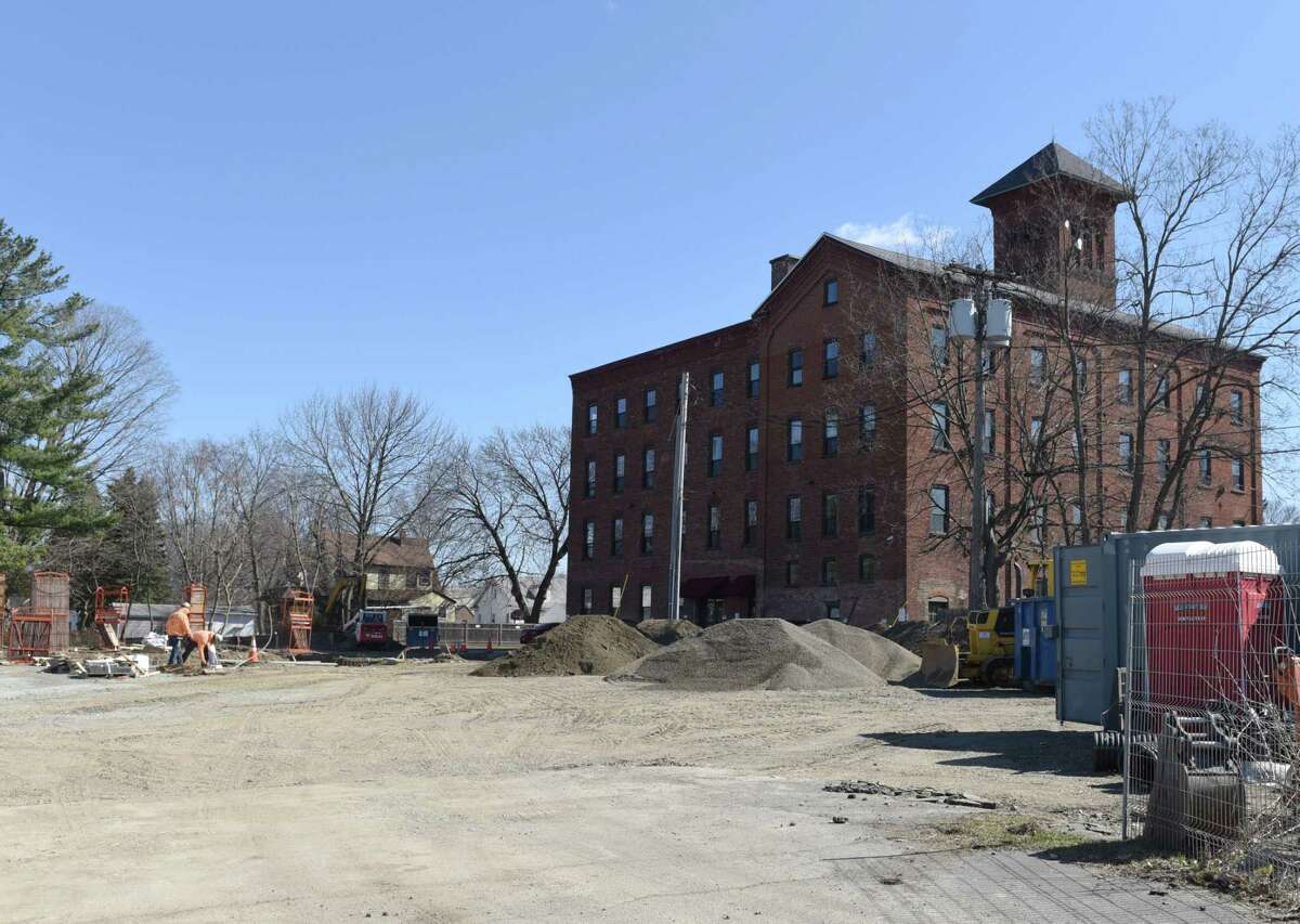 Construction takes place behind the Powers Park Lofts on Thursday, April 4, 2019 in Troy, NY. (Phoebe Sheehan/Times Union)