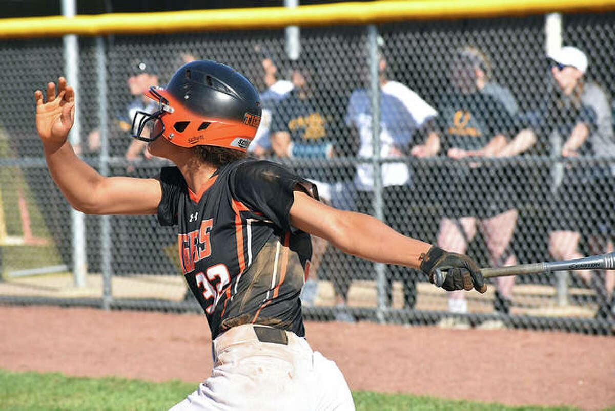 Edwardsville’s Maria Smith watches her solo home run leave the yard in the second inning against O’Fallon on Tuesday in Southwestern Conference action.