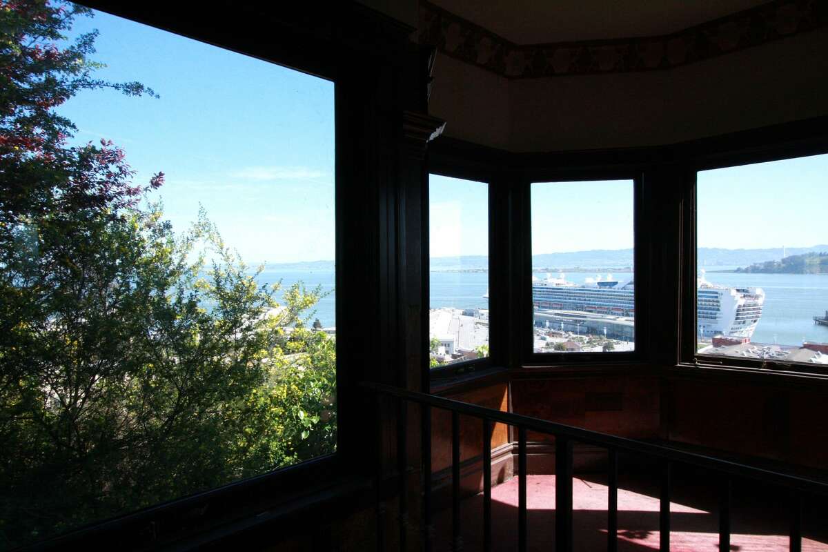The interior of Julius' Castle in North Beach as seen in 2019, as the site gears up for improvements and a reopening, now that its legal woes are behind it. Here, a bank of windows show off some of the views seen from within the restaurant.
