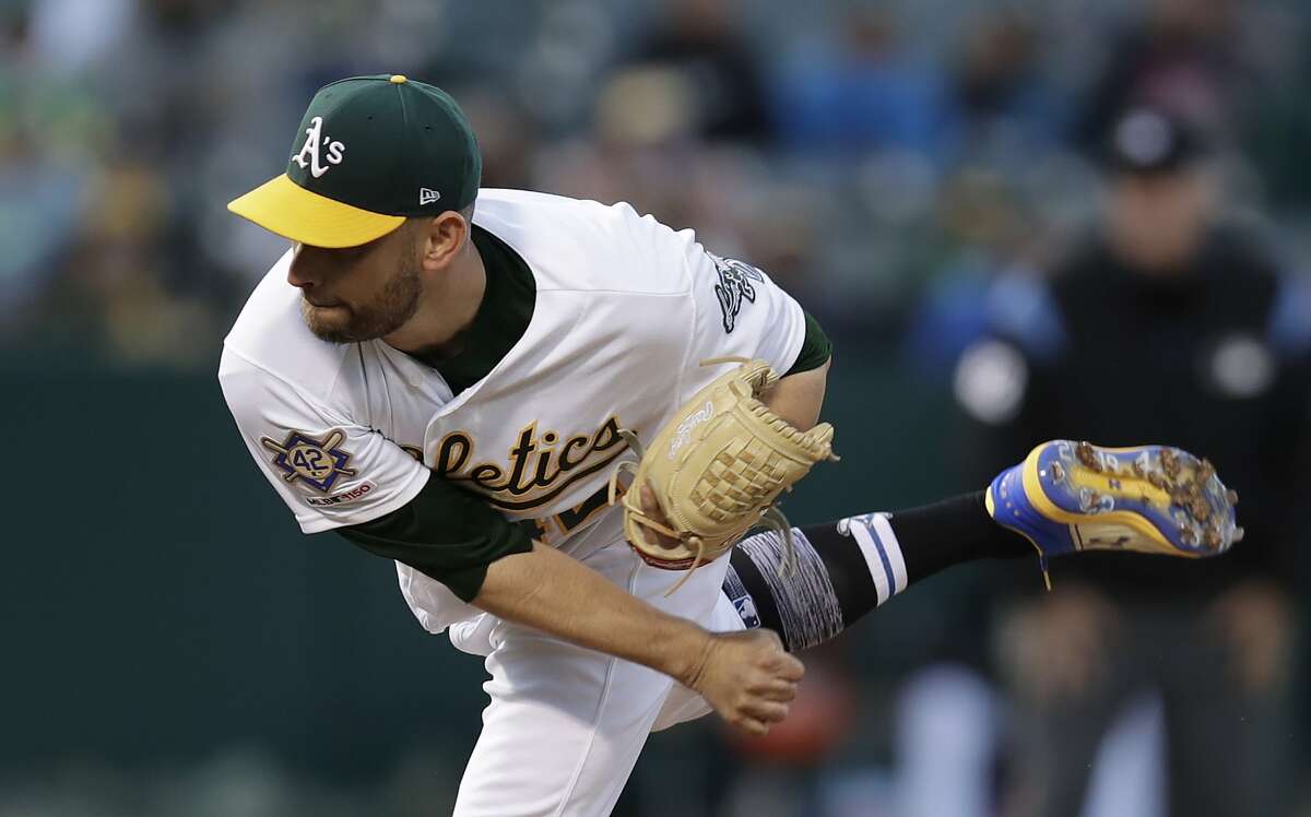 Oakland Athletics pitcher Marco Estrada works against the Houston Astros in the first inning of a baseball game Tuesday, April 16, 2019, in Oakland, Calif. (AP Photo/Ben Margot)
