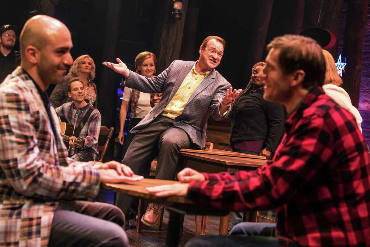 From left, Nick Duckart, Kevin Carolan, Andrew Samonsky and company in the first national tour of "Come From Away."