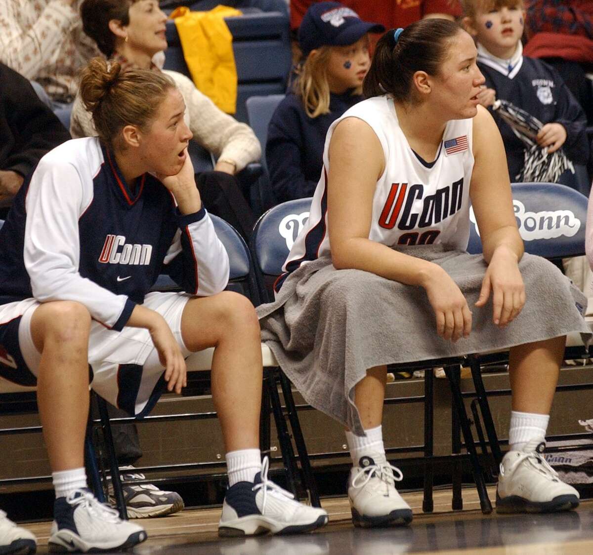 UConn's Ashley Valley, left and her sister Morgan Valley on the bench during a January 2003 game. Morgan Valley was hired as University of Hartford coach Wednesday