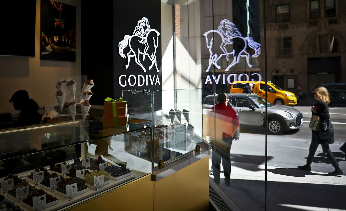 FILE: A display of chocolate treats is displayed at Godiva's just-opened cafe in New York, Tuesday April 16, 2019.
