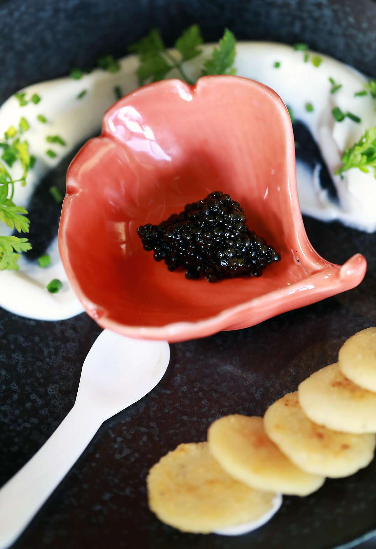 Caviar arepas at Ungrafted, a wine bar located at 2419 3rd St., in San Francisco, Calif., on Wednesday, April 10, 2019.