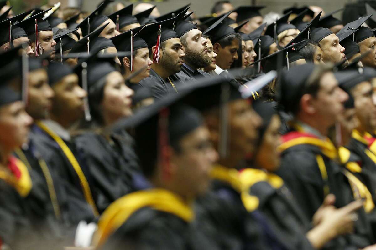 University of the Incarnate Word graduates listen to speakers during their commencement ceremony held Saturday May 12, 2018 at Freeman Coliseum
