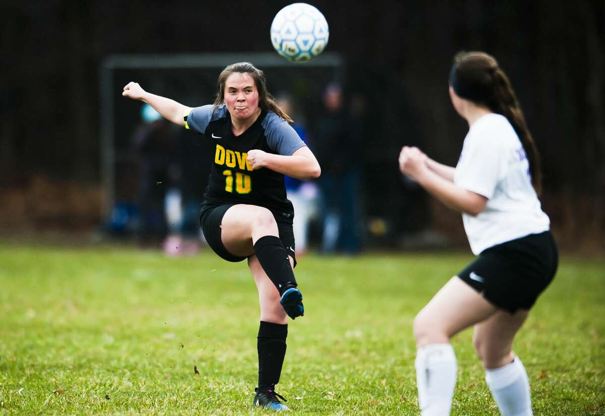 Dow's Elizabeth Green takes a shot on goal during a game against Bay City Central on Wednesday, April 17, 2019 at H. H. Dow High School. (Katy Kildee/kkildee@mdn.net)
