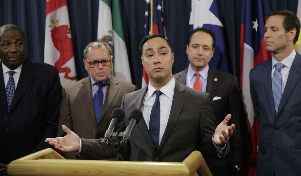U.S. Rep. Joaquin Castro, D-Texas, center, stands with state senators as he addresses a GOP-backed resolution in the Texas Legislature supporting President Donald Trump's declaration of an emergency on the U.S.-Mexico border has reignited an immigration debate in the Capitol, Wednesday, April 17, 2019, in Austin, Texas. (AP Photo/Eric Gay)