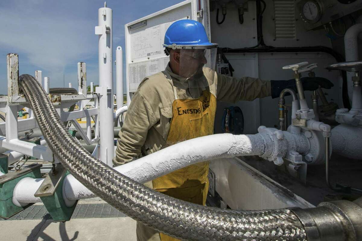 Miguel Cortillo gets a tanker of liquefied natural gas ready at Stabilis Energy in George West to transport it to Laredo on Tuesday, April 2, 2019, in George West.