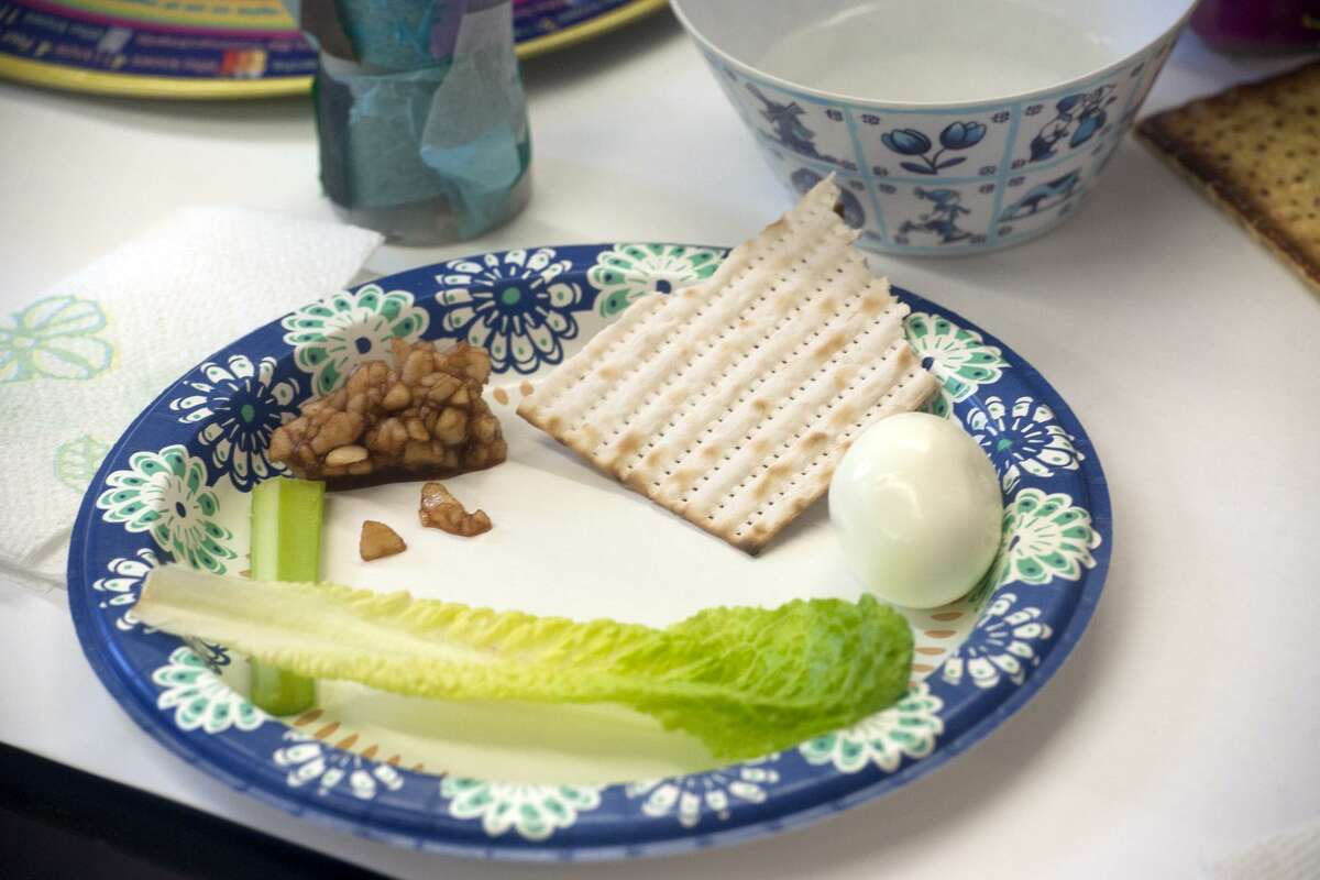 The Seder plate during a Seder meal for nursery school students at Congregation B'nai Torah, in Trumbull, Conn. April 8, 2019.