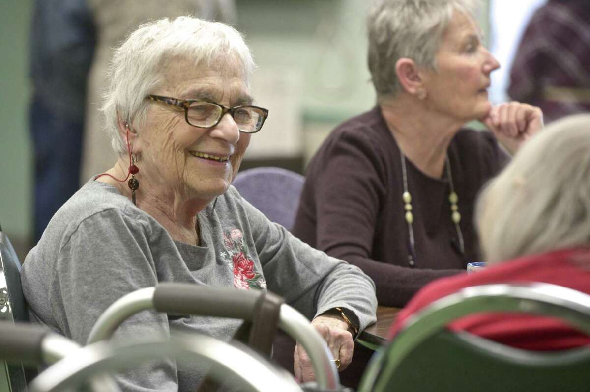 Ruth Gottliev, of New Milford, talks with a table mate at the Senior Center in New Milford. The center and the Community Culinary School of Northwestern Connecticut have teamed up to offer locally made meals to seniors. Wednesday, April 17, 2019, in New Milford, Conn.