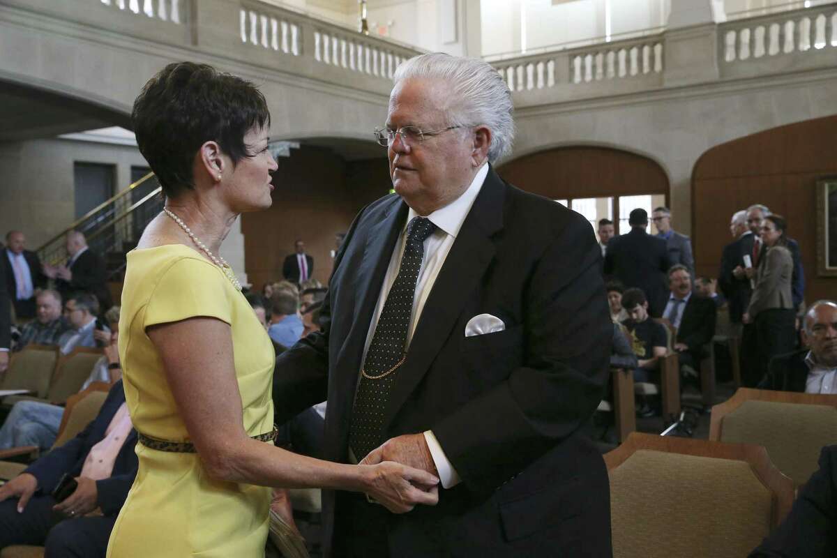 Texas State Sen. Donna Campbell, (R-New Braunfels), greets Cornerstone Church Pastor John Hagee before the start of a regular city council meeting, Thursday, April 18, 2019. They attended the meeting in support of a proposal by Councilman Greg Brockhouse revisiting a controversial decision last month to remove Chick-fil-A from an airport contract because of its Òlegacy of anti-LGBTQ behavior.Ó The council voted against the proposal.