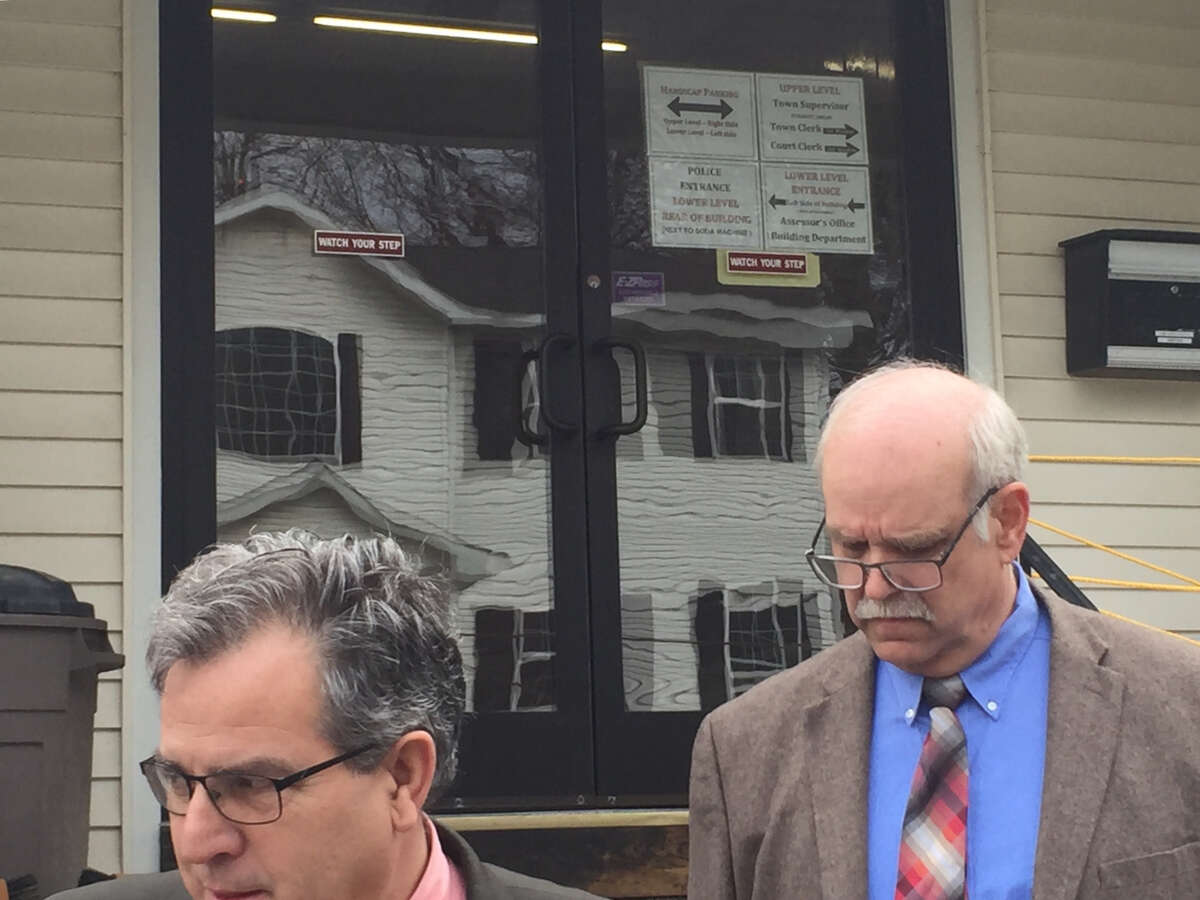 Former state Office of Mental Health supervisor John Allen walks behind his attorney, Kevin Luibrand, following an appearance in Coeymans Town Court on Thursday, April 18.