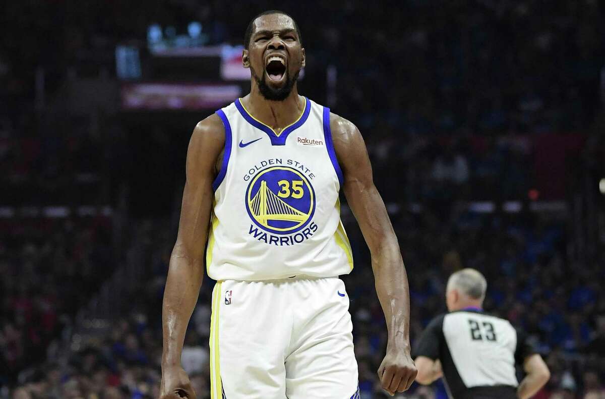 Golden State Warriors forward Kevin Durant celebrates after scoring during the first half in Game 3 of the team's first-round NBA basketball playoff series against the Los Angeles Clippers on Thursday, April 18, 2019, in Los Angeles.