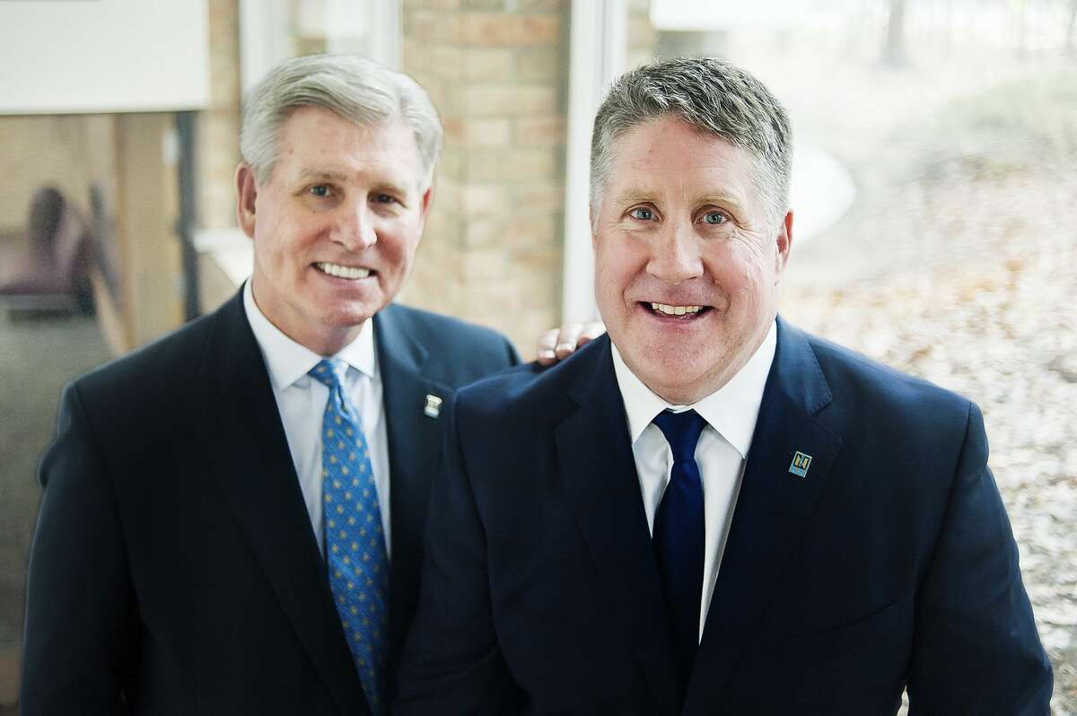 Dr. Kent MacDonald, right, the incoming President of Northwood University, poses for a portrait alongside current President Keith Pretty, left, on Thursday, April 18, 2019 at the university. (Katy Kildee/kkildee@mdn.net)