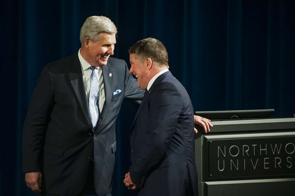 Dr. Kent MacDonald, right, the incoming President of Northwood University, shares a laugh with current President Keith Pretty, left, before an event announcing MacDonald's appointment on Thursday, April 18, 2019 at the university. (Katy Kildee/kkildee@mdn.net)